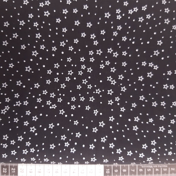 Patchwork stof jul, sort med små sølv stjerner.