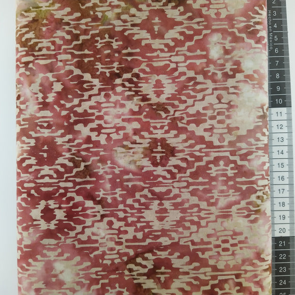 Patchwork stof, lyserød/ lilla meleret med et stor mønsteret motiv.