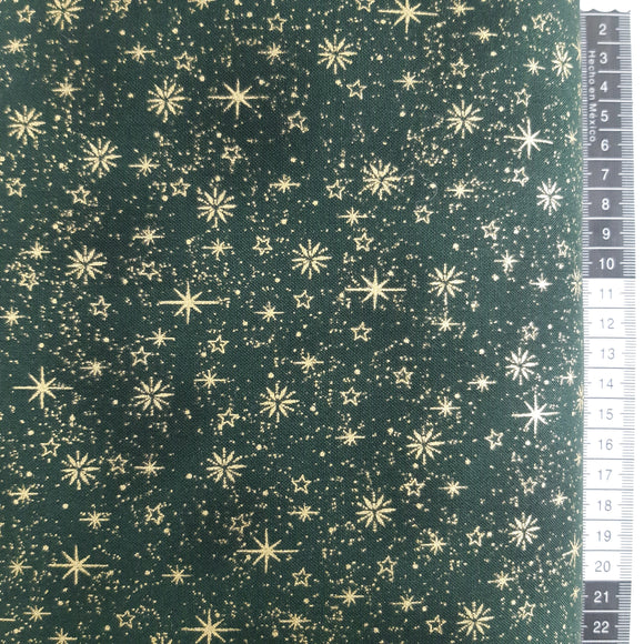 Patchwork stof jul, grøn meleret med guld stjerner, snefnug og drys.