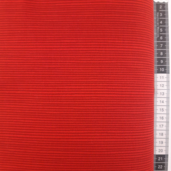 Patchwork stof, rød bund med streger