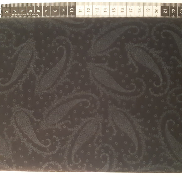Patchwork stof, sort med elegant sjalsmønster.