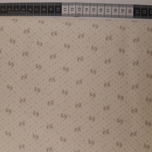 Patchwork stof, the i råhvid med små prikker der danner mønster.