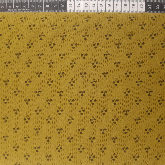 Patchwork stof, oliven grøn med små prikker og stjerne blomst.