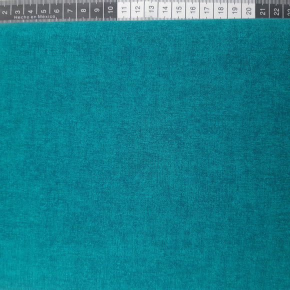 Patchwork stof, klar turkis blå meleret tone i tone. Farve 817