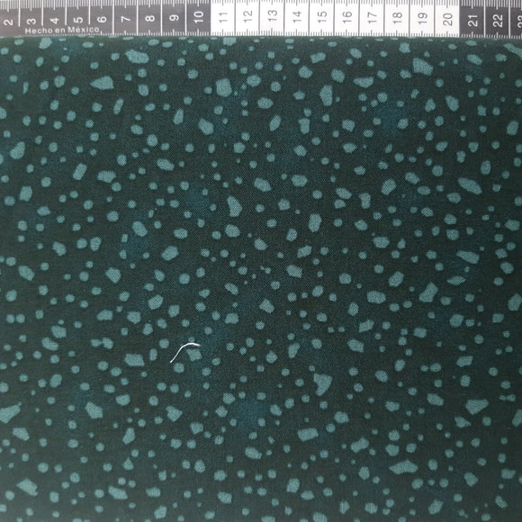 Patchwork stof,  mørk grøn med lyse plamager der ligner isflager.