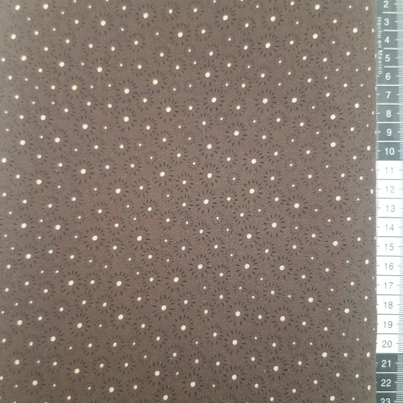Patchwork stof,  mørk brun med små sole, prikker. farve 471