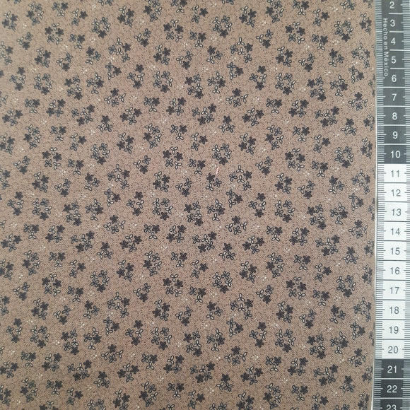Patchwork stof, brun med mini blomst.