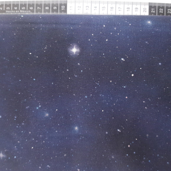 Patchwork stof, mørkeblå nattehimmel med stjerner og stjerne vrimmel.