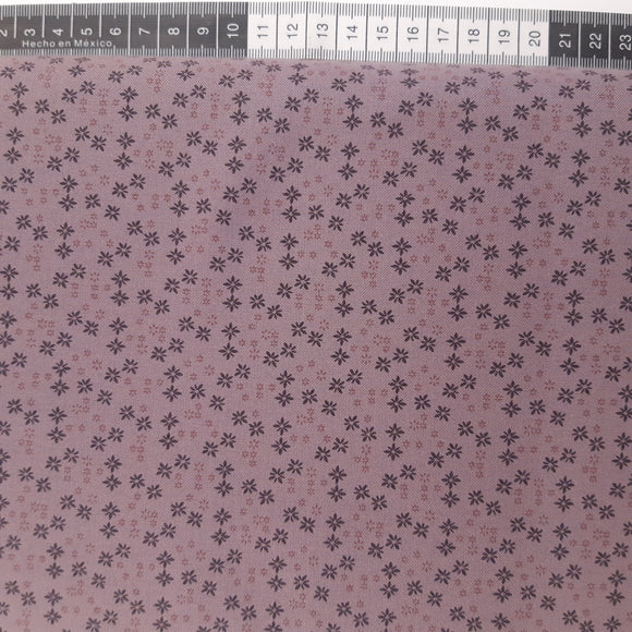 Patchwork stof, støvet lilla med mini blomster.