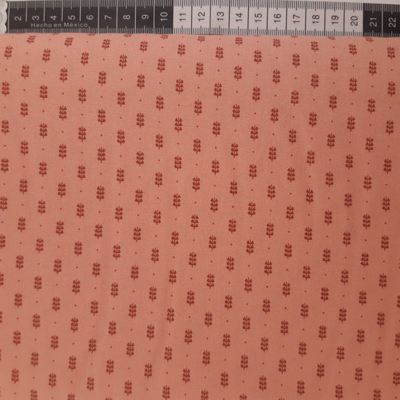 Patchwork stof, lyserød med små aks og prik.