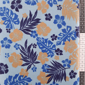 Patchwork stof, blå bund med store fligede blade og blomster