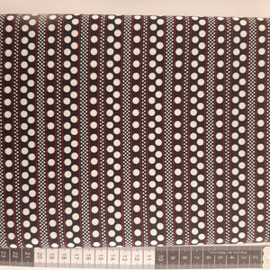 Patchwork stof, sort med smalle røde striber og hvide prikker
