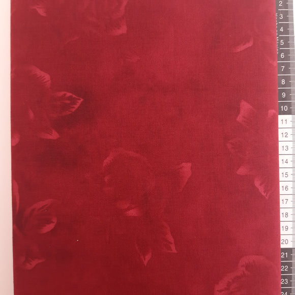 Patchwork stof, mørk rød/lila tone i tone melering af en rose