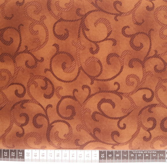 Patchwork stof, brun med store svirvler stormønstret
