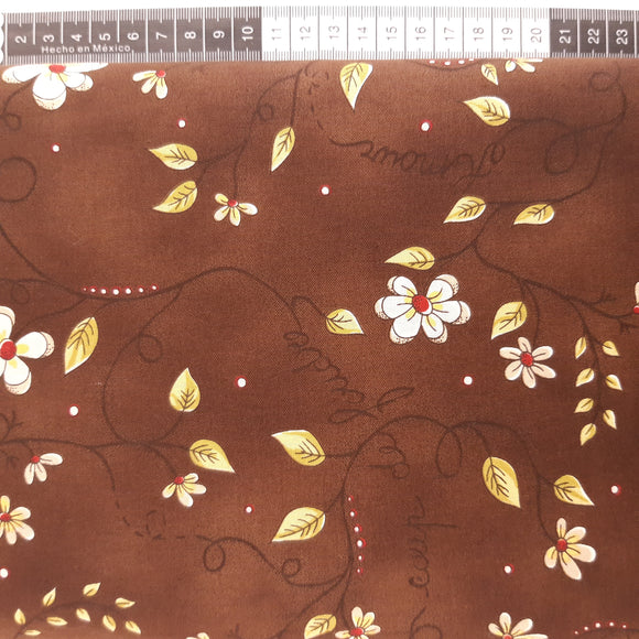 Patchwork stof, mørkebrun med søde blomster, bladranker og tekst