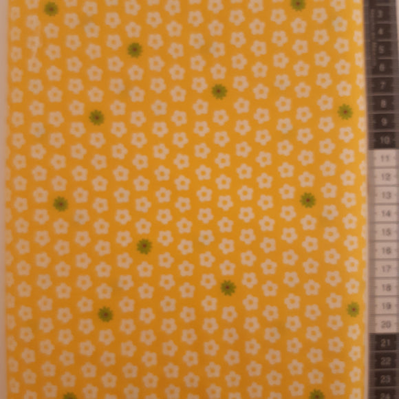 Patchwork stof, gul med små hvide og grønne blomster
