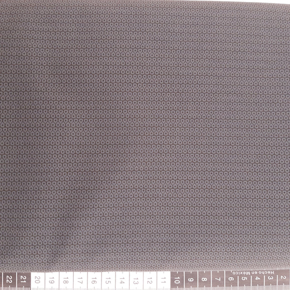 Patchwork stof, sort med koksgrå tæt mønster af små dråber.