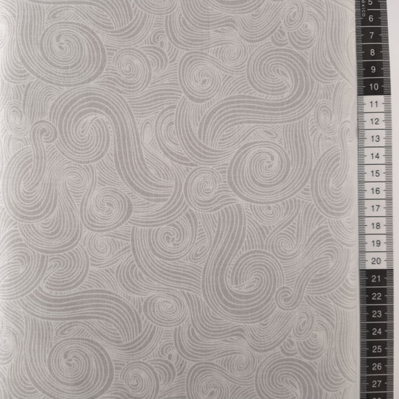 Patchwork stof, stor mønstret med grå og hvide farver minder om en god omgang blæse vejr.