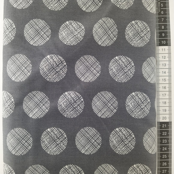 Patchwork stof, mørkegrå bund med store cirkler med grafisk design