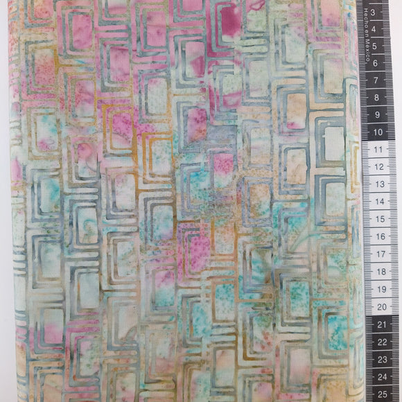 Patchwork stof, pastel turkis og multifarvet med et flot stor mønstret med firkanter.