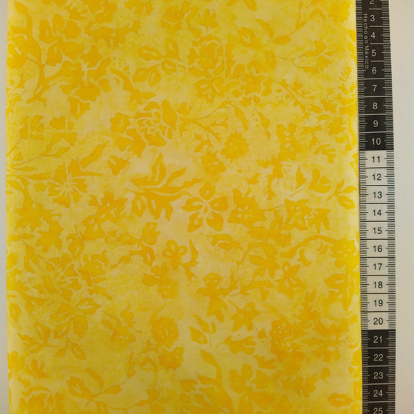Patchwork stof, lysegul meleret bund med små smukke klare gule blomster på stilke med blade.